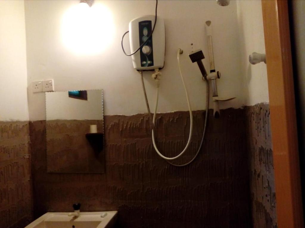 Koupelna v ubytování Hotel Samanala Sigiriya