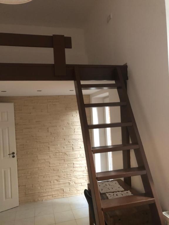A bed or beds in a room at The Whistling Rabbi