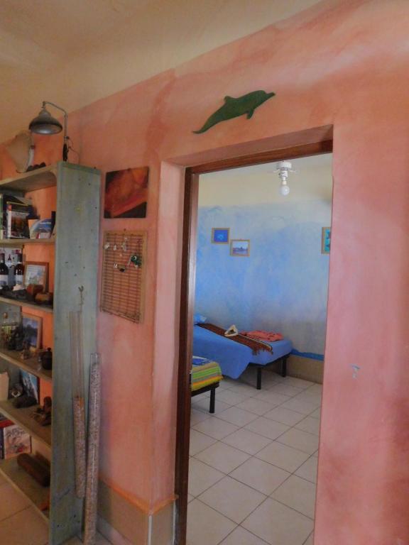 Postel nebo postele na pokoji v ubytování Tortuga B&B
