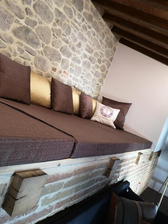 Postel nebo postele na pokoji v ubytování L'Ospitale dei Brilli