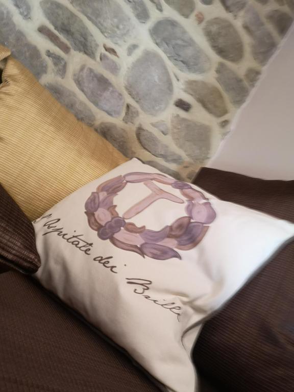 Postel nebo postele na pokoji v ubytování L'Ospitale dei Brilli