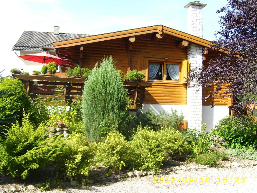 a house with a garden in front of it at Apartments Am Kupferberg in Walkenried