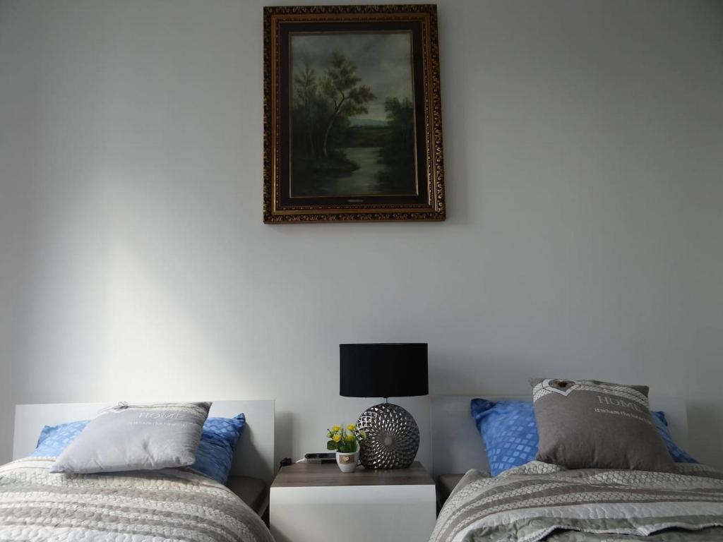 Posteľ alebo postele v izbe v ubytovaní Beautiful City Centre Apartament