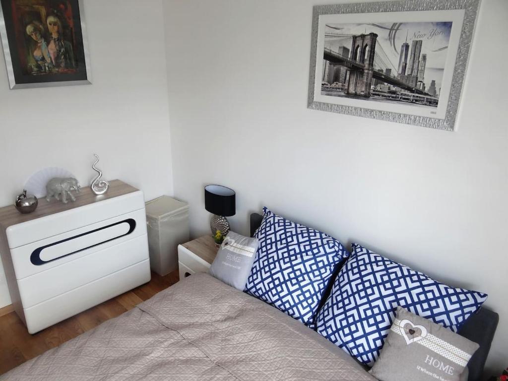 Posteľ alebo postele v izbe v ubytovaní Beautiful City Centre Apartament