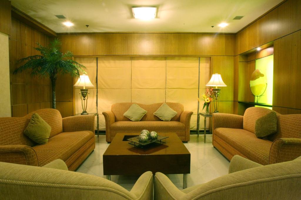 Posezení v ubytování Herald Suites Solana