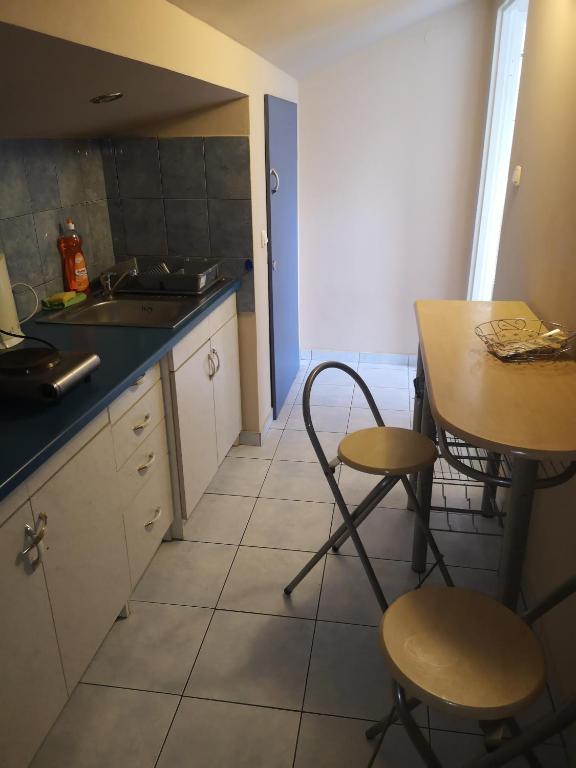 Kuchyňa alebo kuchynka v ubytovaní Apartamenty Hejszowina