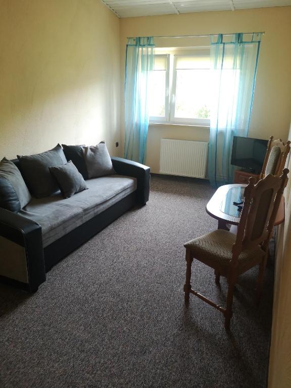 Posedenie v ubytovaní Apartamenty Hejszowina