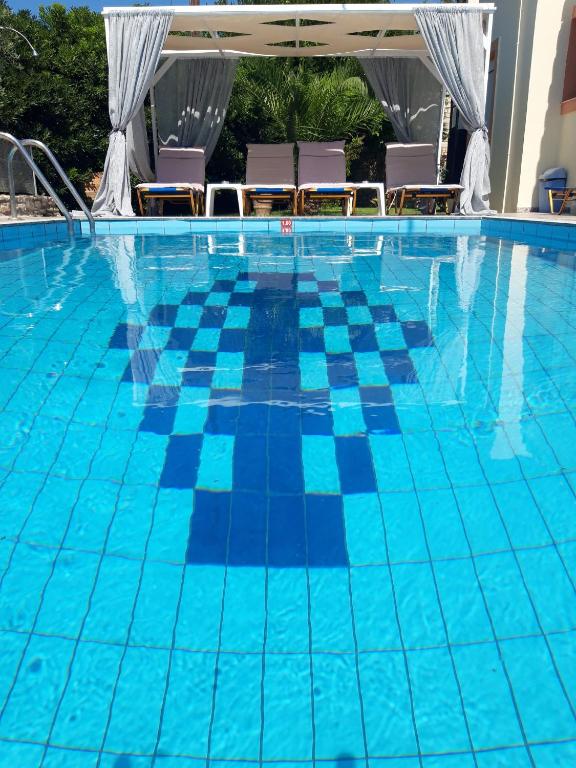 Bazén v ubytování Elena-Pelagia Villas nebo v jeho okolí