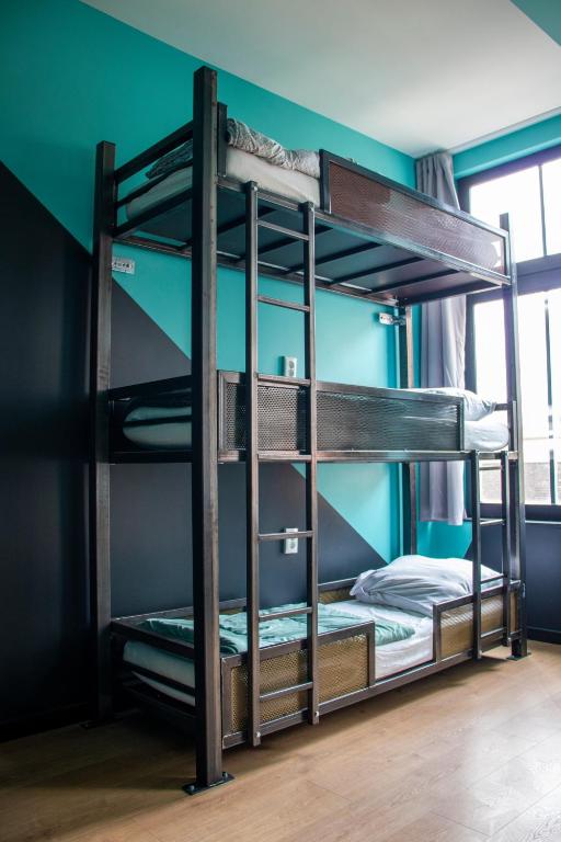 Postel nebo postele na pokoji v ubytování Amsterdam Hostel Leidseplein