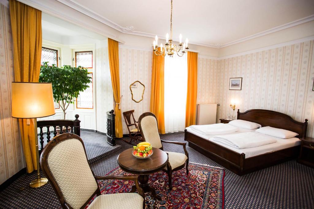 Postel nebo postele na pokoji v ubytování Hotel Atlanta