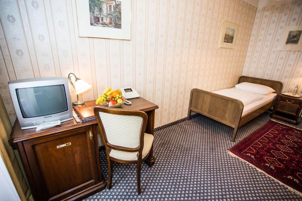 TV a/nebo společenská místnost v ubytování Hotel Atlanta