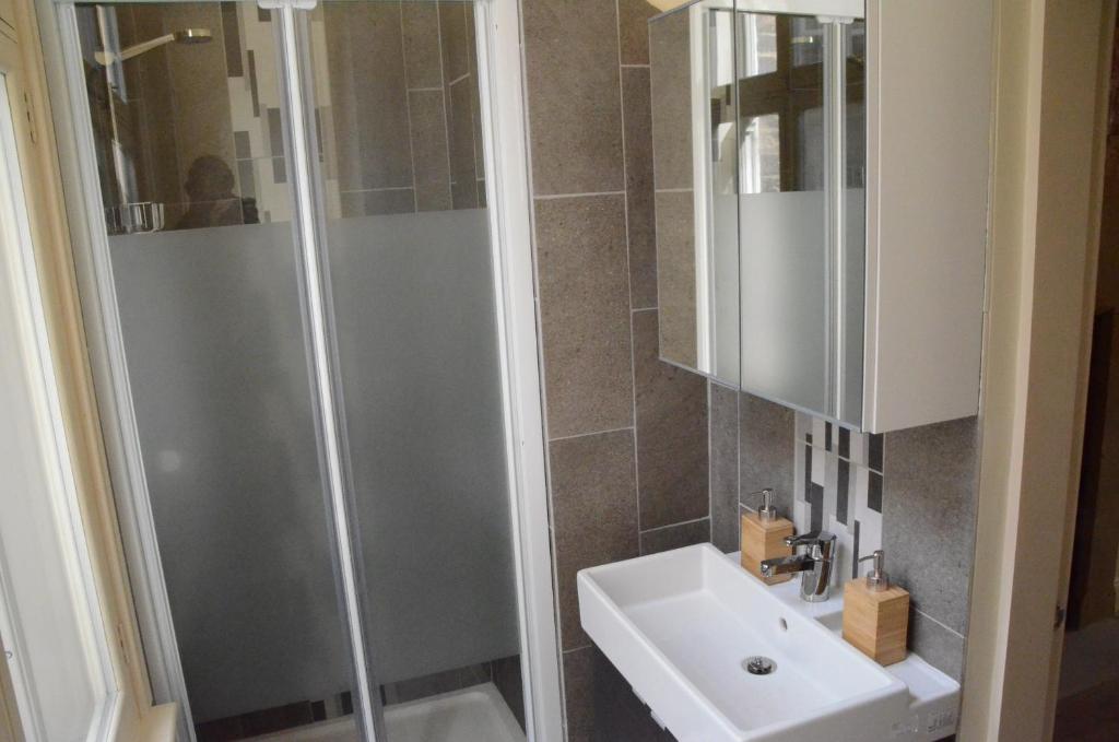 a bathroom with a shower and a sink at 43A Crown Street in Halifax