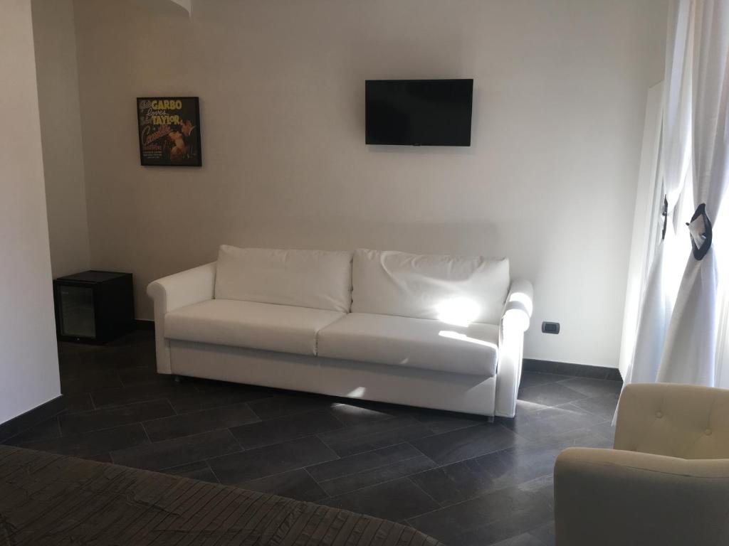 Posezení v ubytování Le Divine di via Olivieri - Reception Via XXV Aprile 5