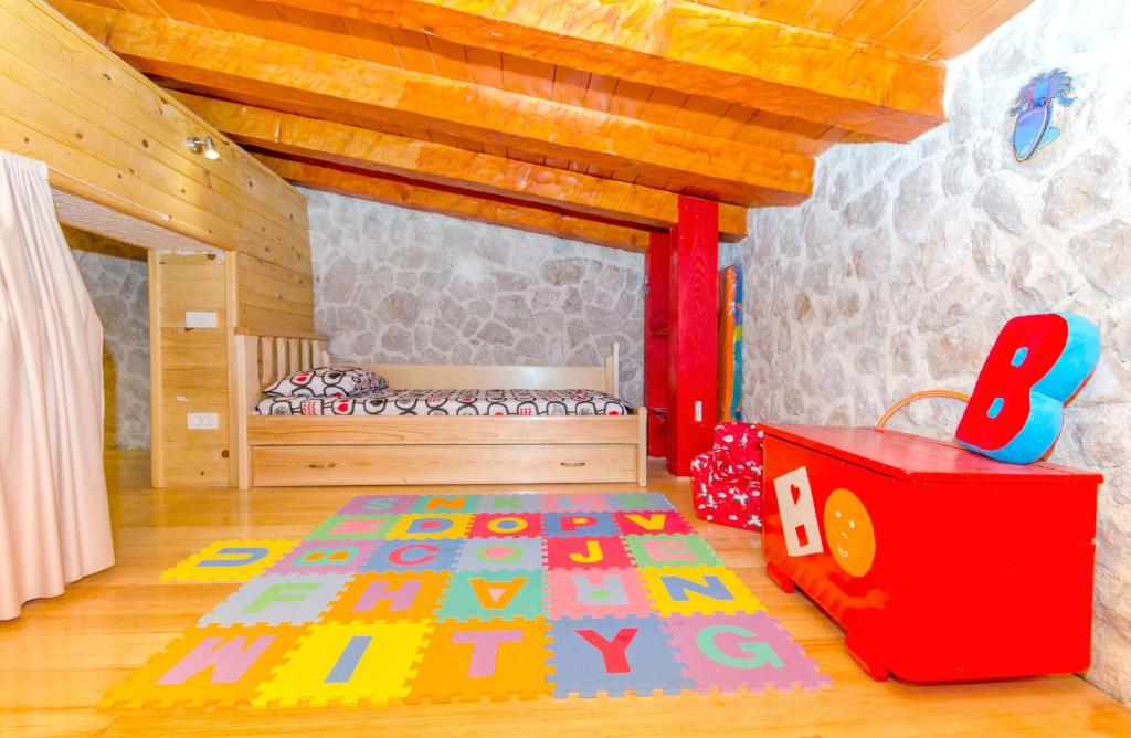 Posteľ alebo postele v izbe v ubytovaní House Srecko