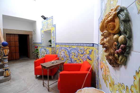 Posezení v ubytování LA CASONA DE BAUTISTA 4 estrellas con piscina montanchez CACERES