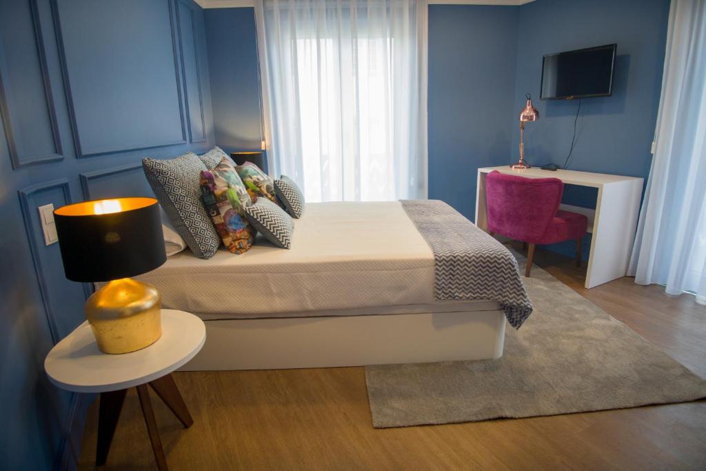 Postel nebo postele na pokoji v ubytování ZIGZAG HOSTEL
