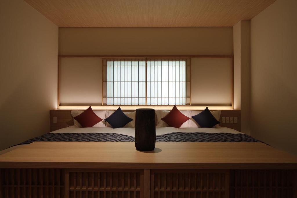 Postel nebo postele na pokoji v ubytování Centurion Hakone Bettei