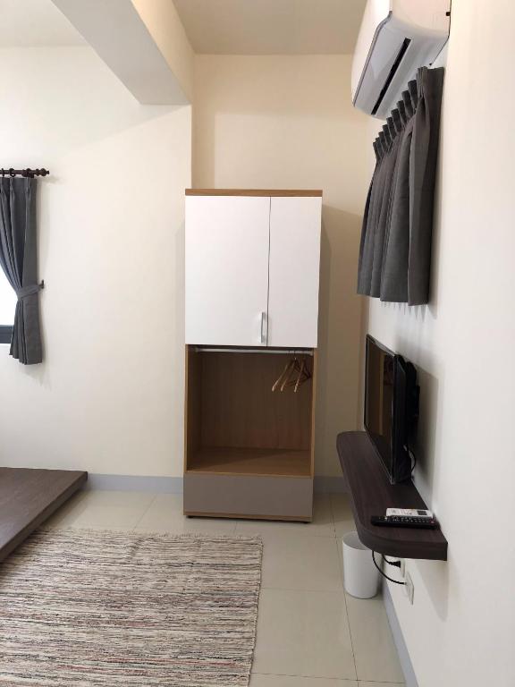 TV a/nebo společenská místnost v ubytování Warm B&B