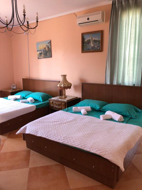 Postel nebo postele na pokoji v ubytování Villa Gardenia Ureki