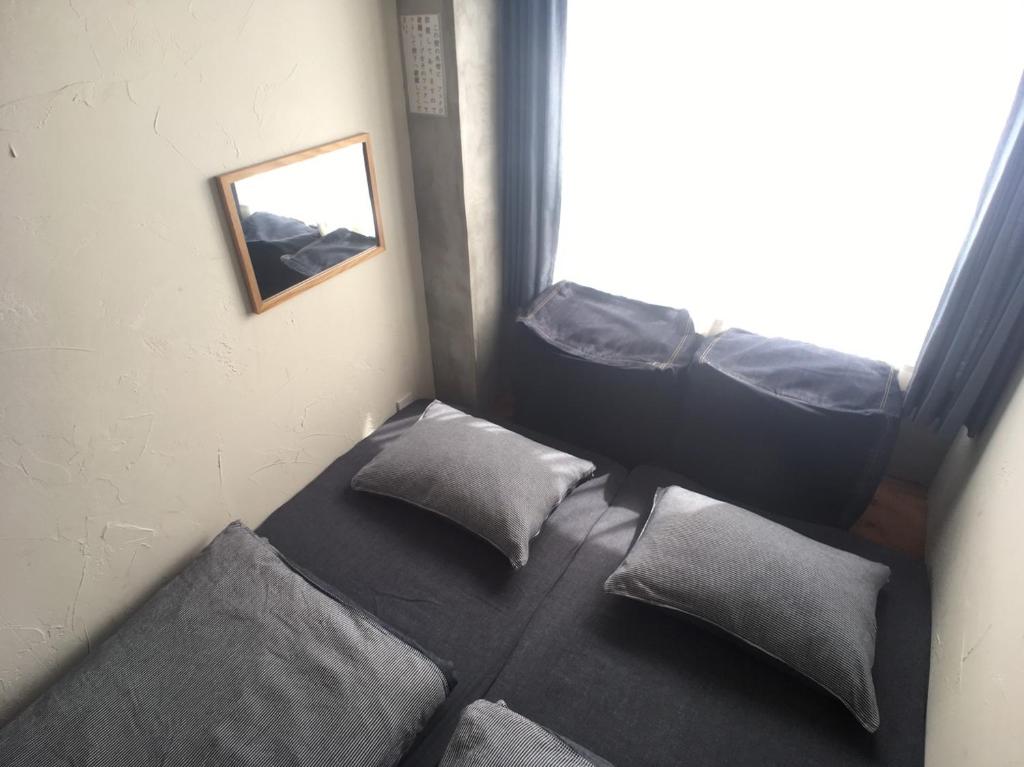 Voodi või voodid majutusasutuse Guest House Golden Mile Hostel toas