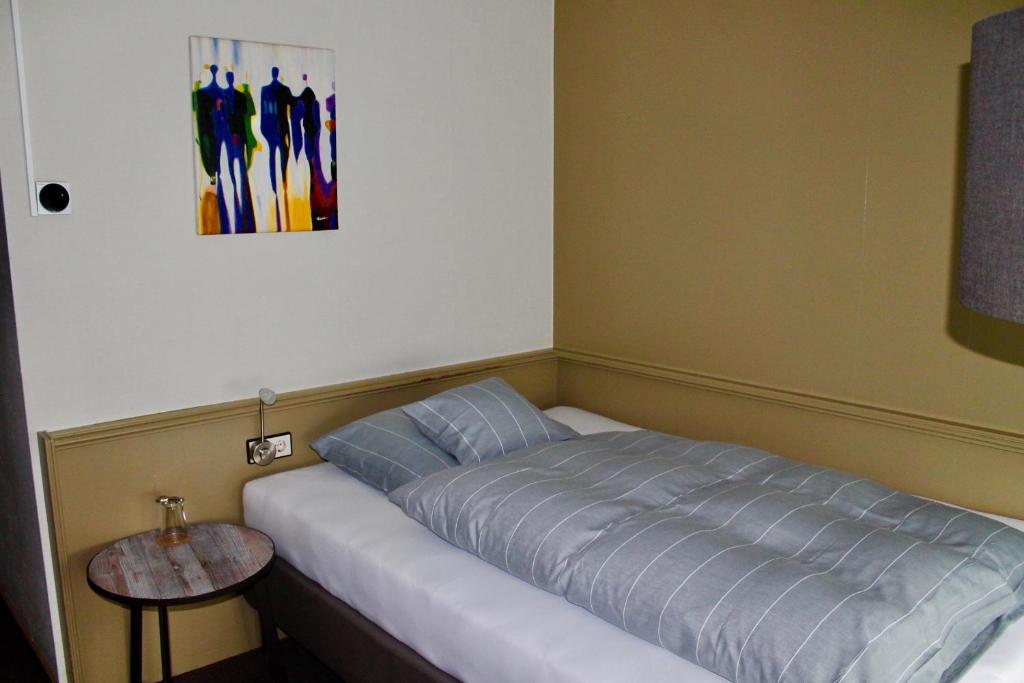 Postel nebo postele na pokoji v ubytování Hotel Donnersberg