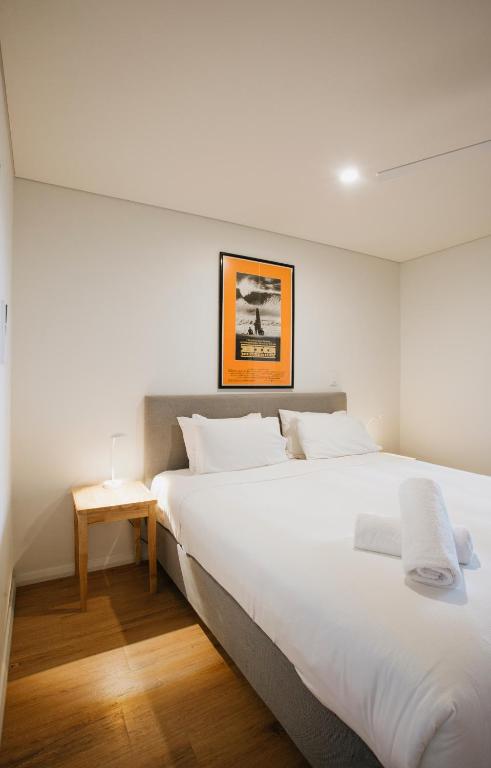 Postel nebo postele na pokoji v ubytování Canal Rocks Beachfront Apartments