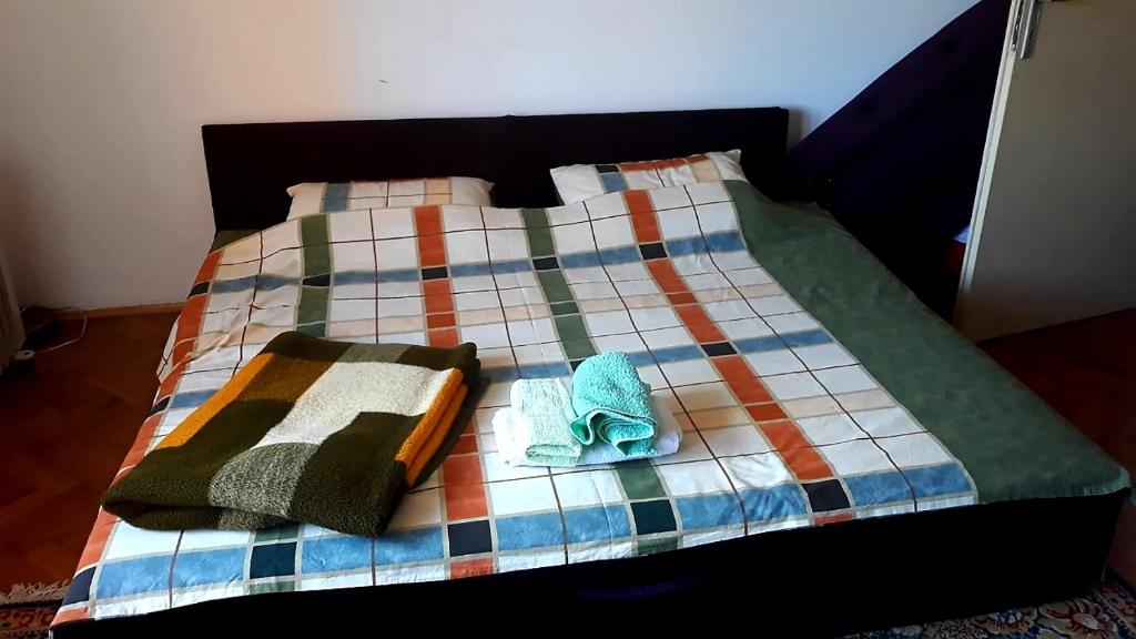 Postel nebo postele na pokoji v ubytování Apartmani Centar Banja Vrujci