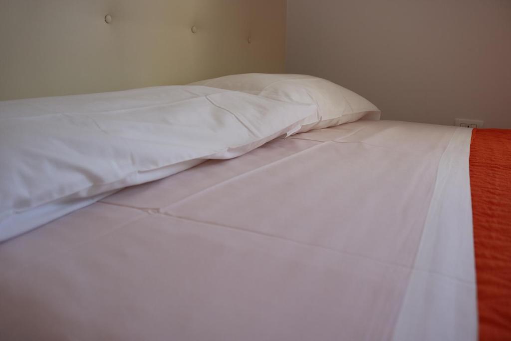 A bed or beds in a room at Atmosphera Casarano