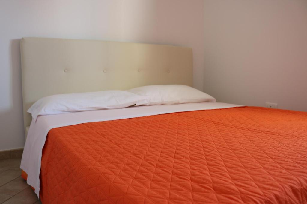 A bed or beds in a room at Atmosphera Casarano