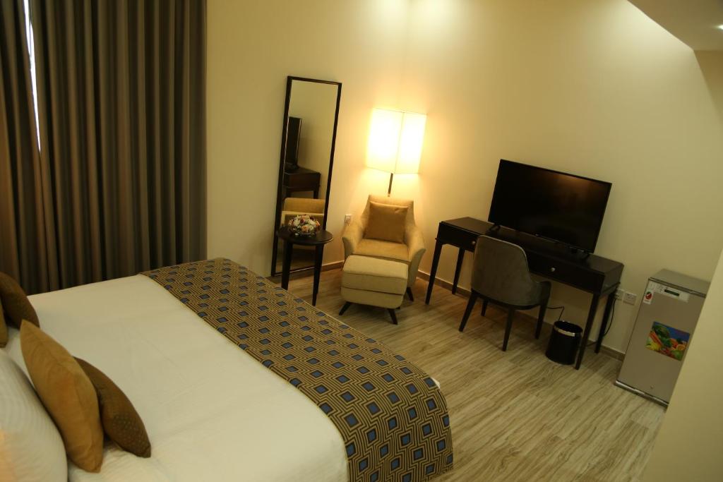 تلفاز و/أو أجهزة ترفيهية في Uptown Hotel Apartment Fujairah By Gewan