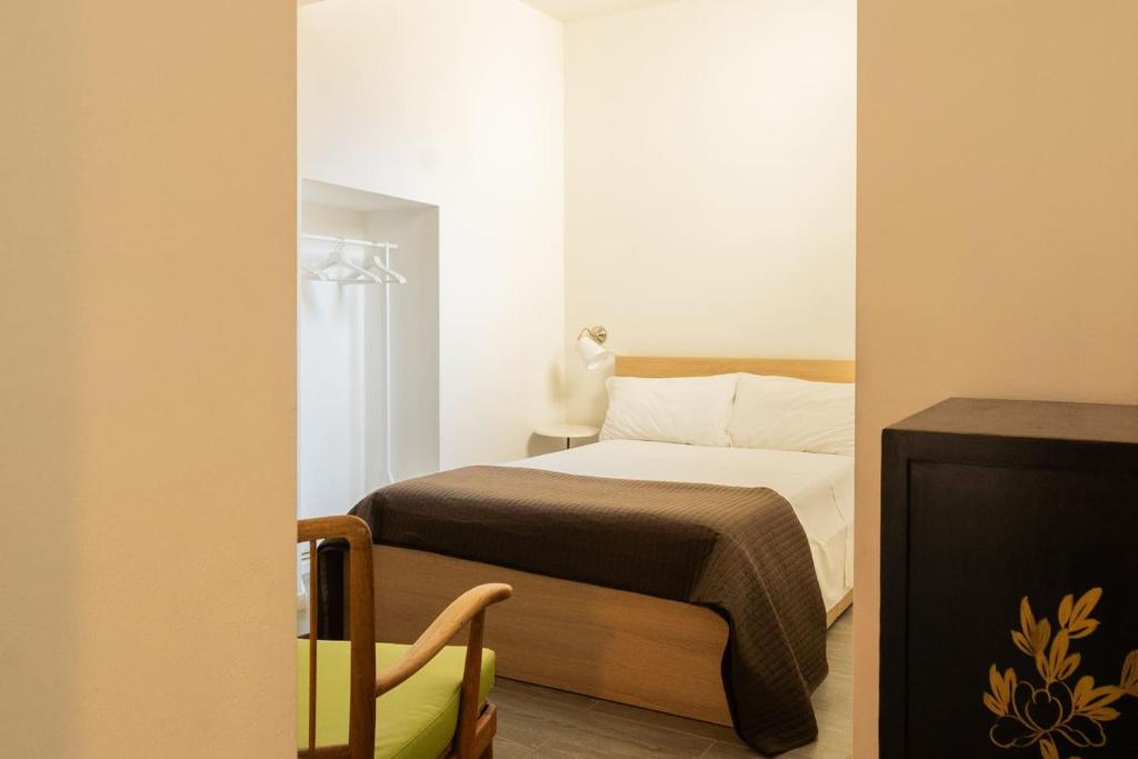 Postel nebo postele na pokoji v ubytování Romantic Pier by Rent All Como