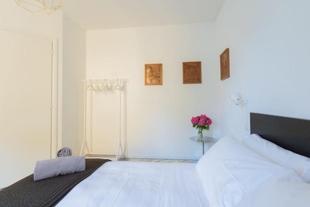 Postel nebo postele na pokoji v ubytování Romantic Pier by Rent All Como