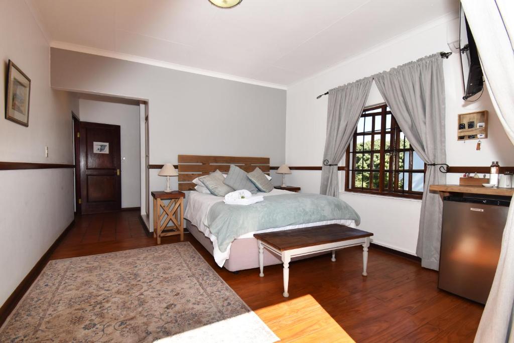 Letto o letti in una camera di Cuckoos Nest Guest House