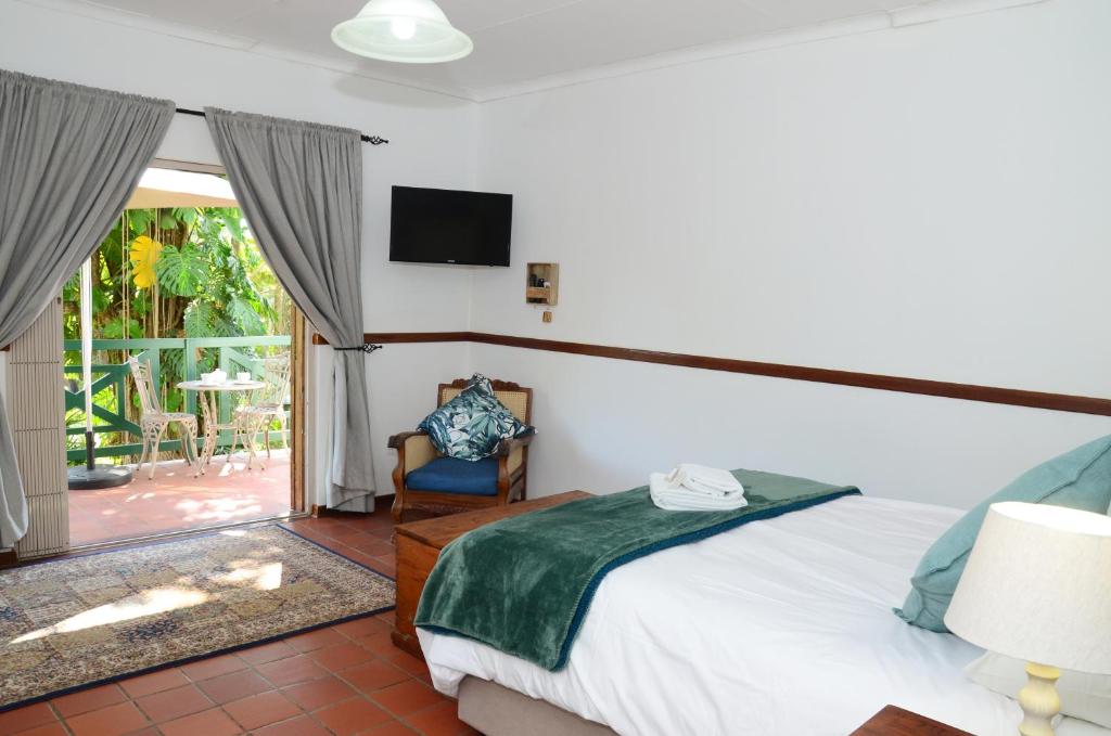 Letto o letti in una camera di Cuckoos Nest Guest House