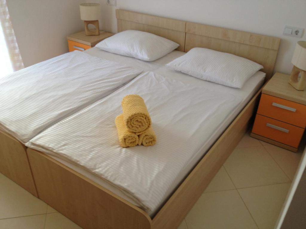 Posteľ alebo postele v izbe v ubytovaní Apartments Villa Amalia