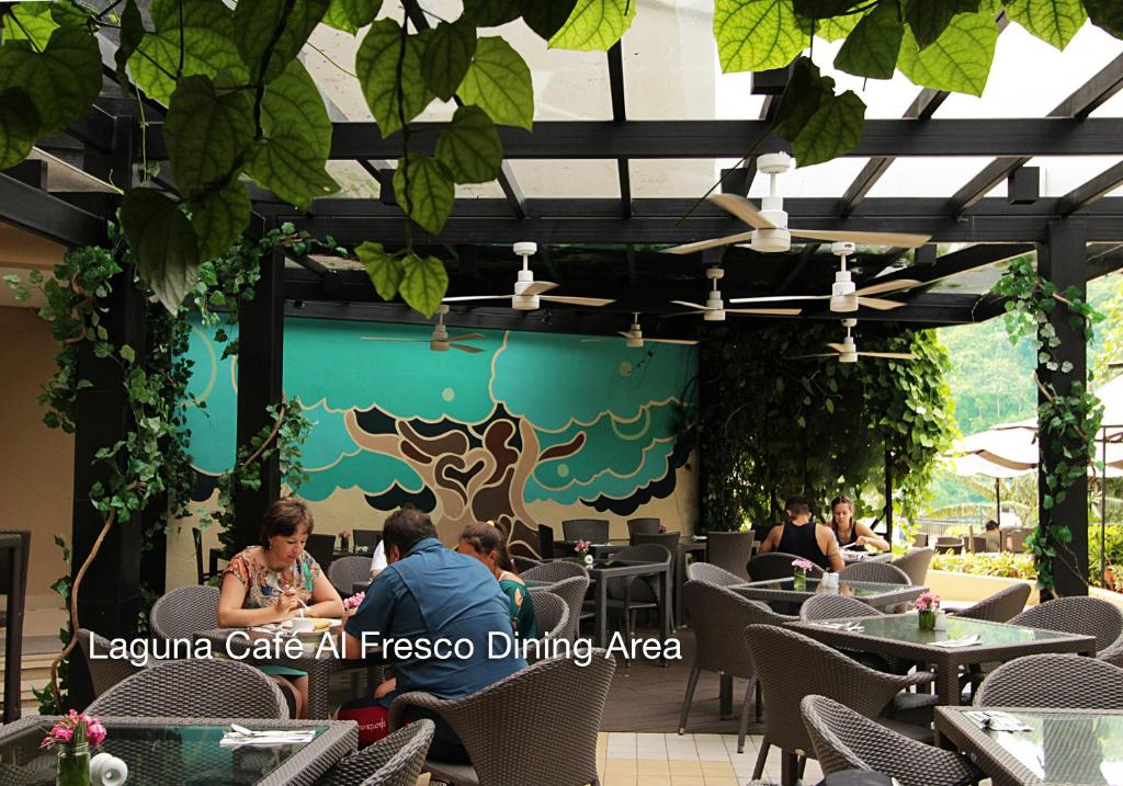 a restaurant with people sitting at tables at Fairways and Bluewater Boracay in Boracay