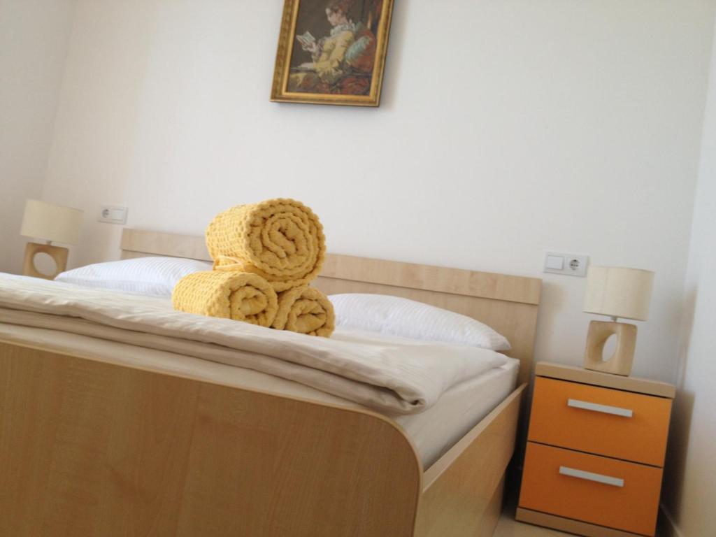 Posteľ alebo postele v izbe v ubytovaní Apartments Villa Amalia