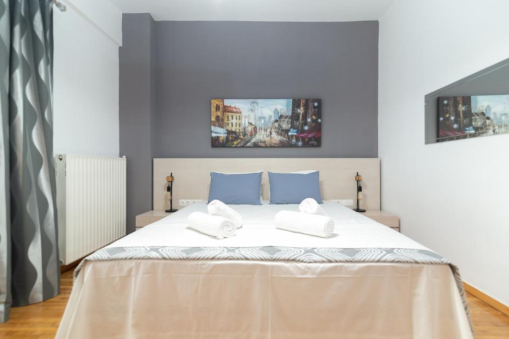 Postel nebo postele na pokoji v ubytování Hermes by Heloni Apartments