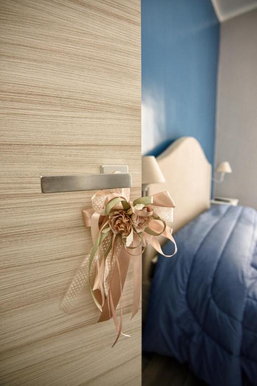 Postel nebo postele na pokoji v ubytování B&B Grazia