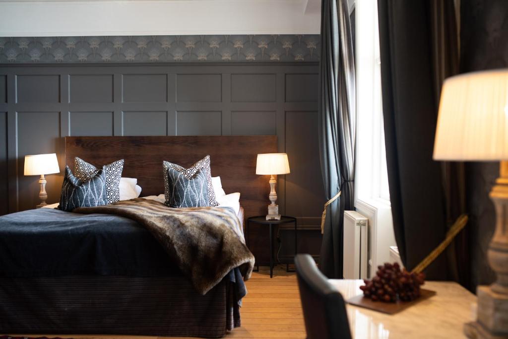 Postel nebo postele na pokoji v ubytování Waxholms Hotell
