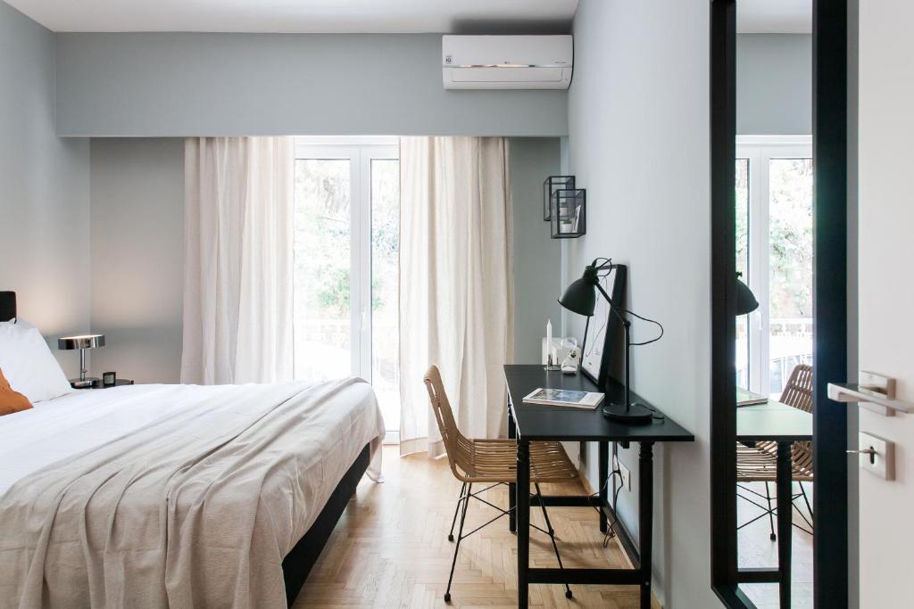 Posteľ alebo postele v izbe v ubytovaní Peaceful 2BD Apartment in Kolonaki by UPSTREET