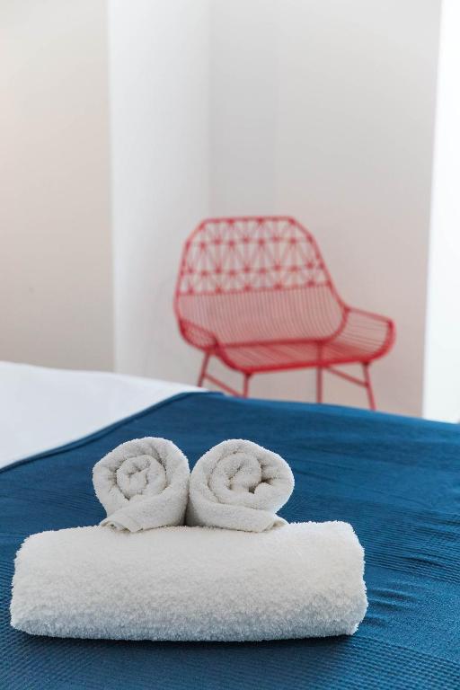 Posteľ alebo postele v izbe v ubytovaní APARTMANI VIGO