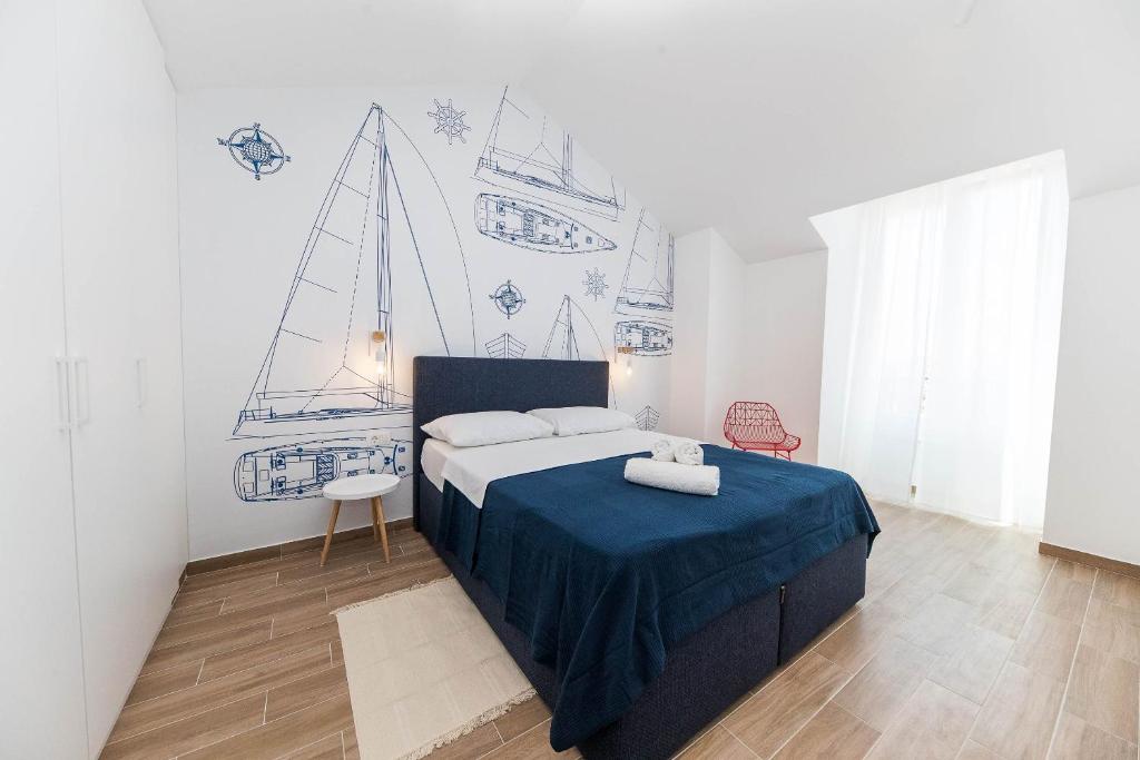 Posteľ alebo postele v izbe v ubytovaní APARTMANI VIGO
