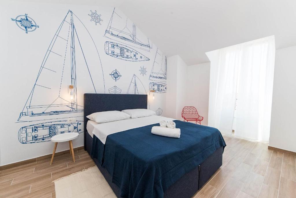 Posteľ alebo postele v izbe v ubytovaní APARTMANI VIGO