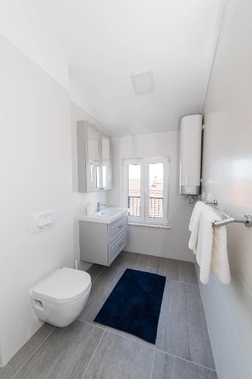 Kúpeľňa v ubytovaní APARTMANI VIGO