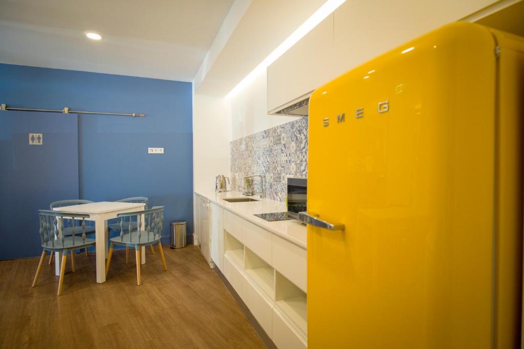 Kuchyň nebo kuchyňský kout v ubytování ZIGZAG HOSTEL