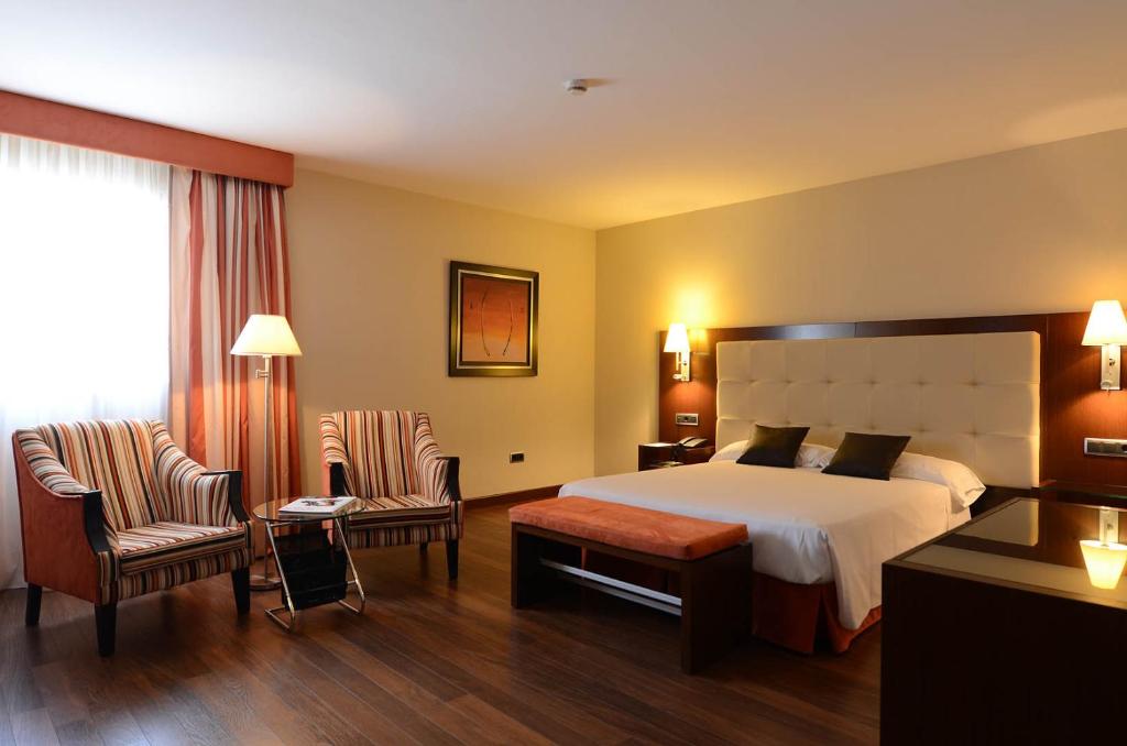 Posteľ alebo postele v izbe v ubytovaní Hospedium Hotel Mirador de Gredos