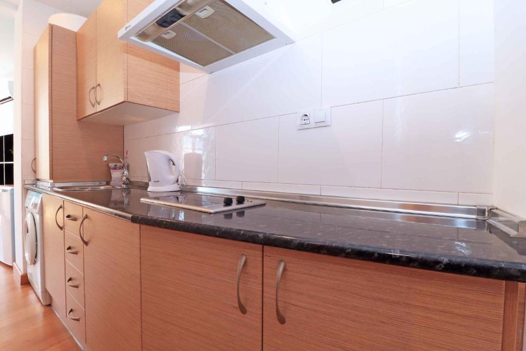 Kuchyň nebo kuchyňský kout v ubytování Del parque flats estudio lagunillas