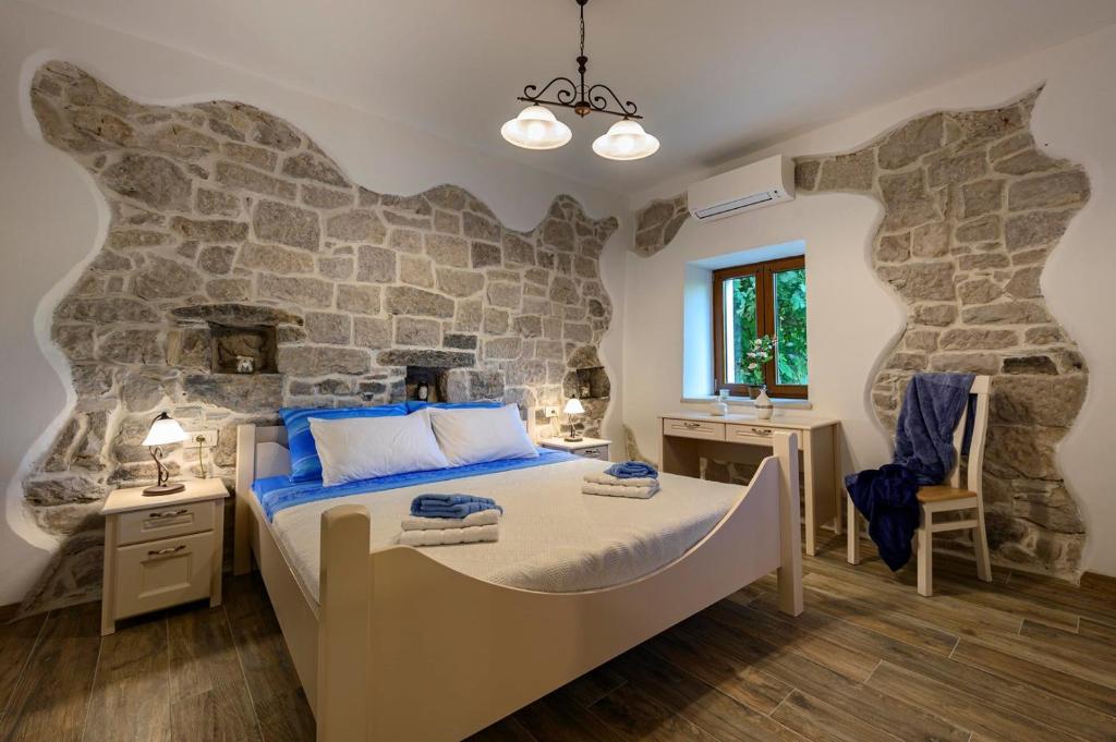 Postel nebo postele na pokoji v ubytování Villa Dajana
