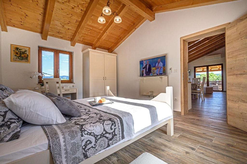 Postel nebo postele na pokoji v ubytování Villa Dajana